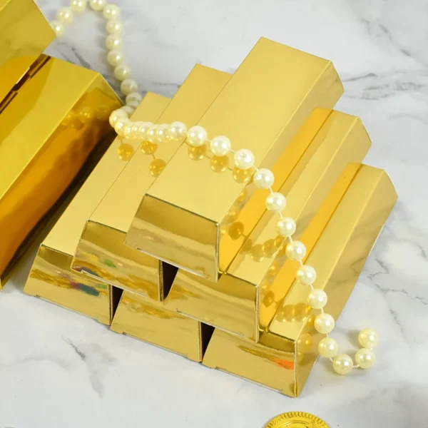 Caja de papel dorado en forma de lingote de oro